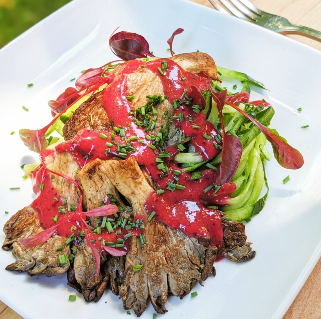 five spice roasted oyster mushroom on cucumber noodles with summer berry-ginger vinaigrette