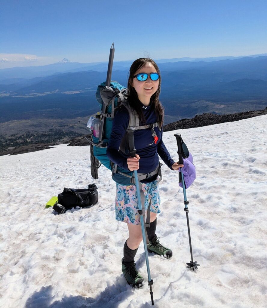 chef mia mountaineering on mt adams expedition with backpack