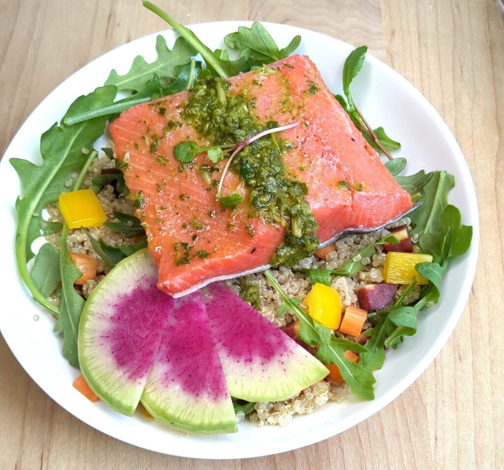wild salmon with chimichurri over quinoa salad & watermelon radish