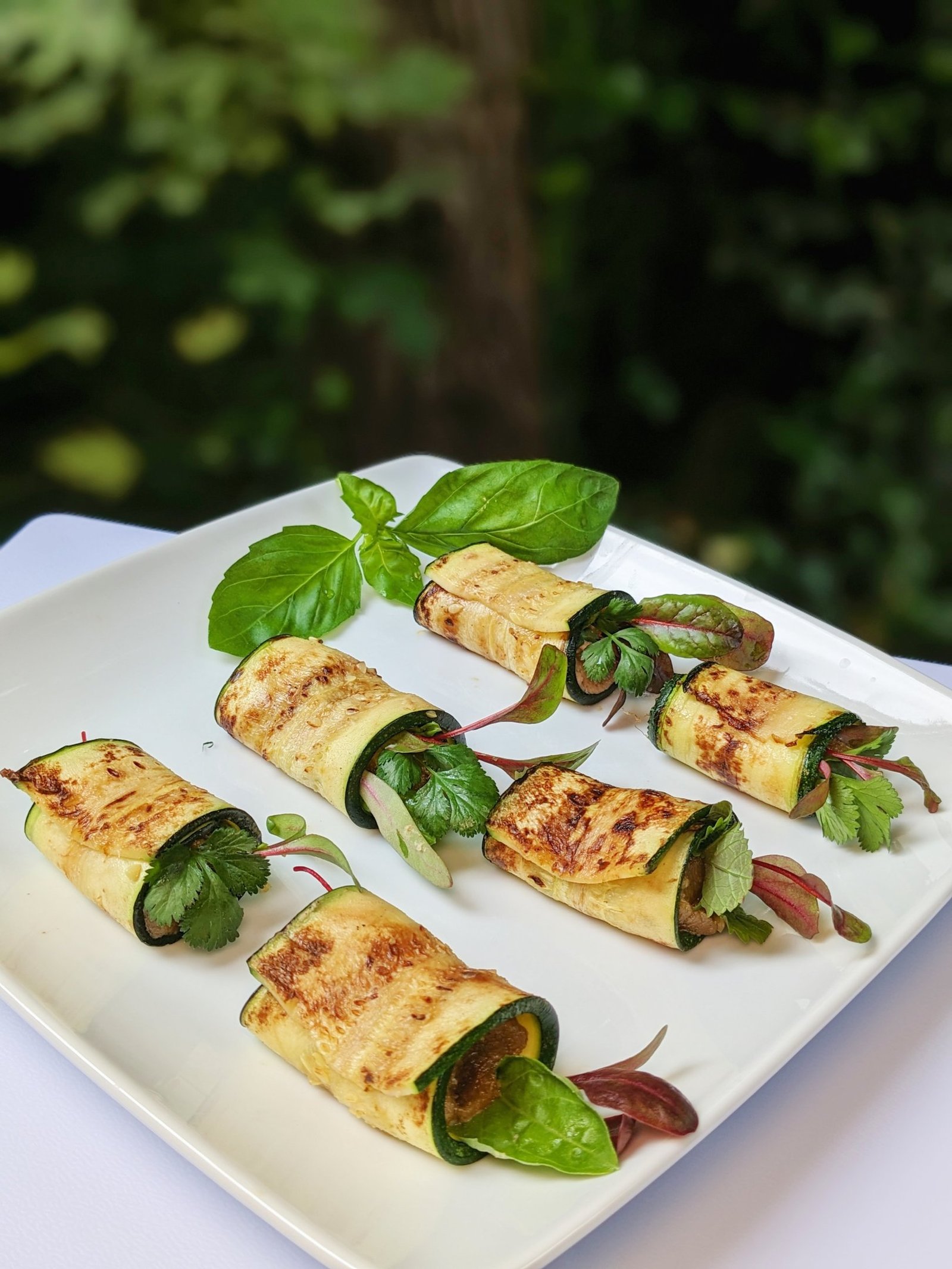 Zucchini Rollups with hazelnut butter, quinoa & herbs. Best personal chef Lake Oswego. Gluten-free